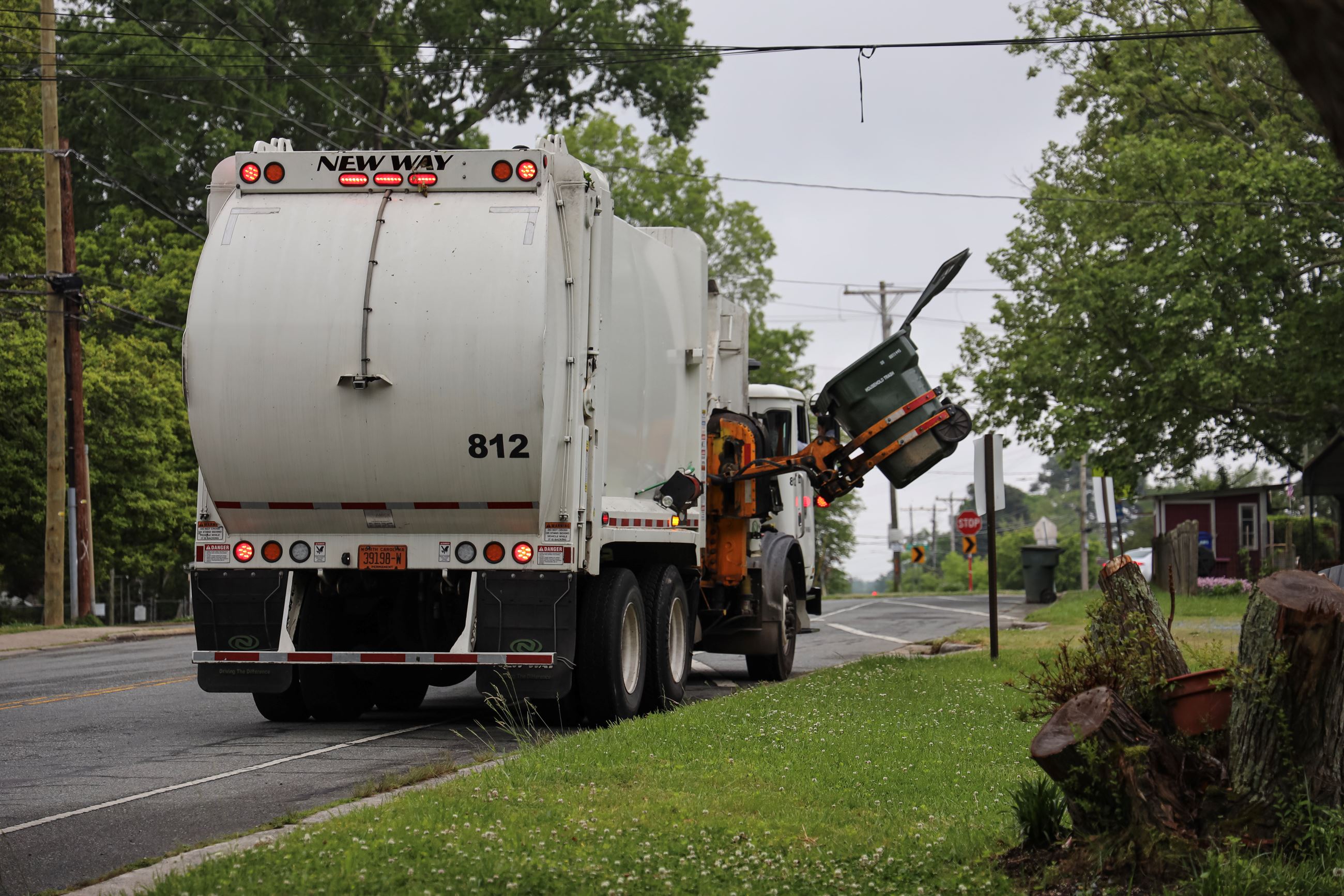Waste Collection Truck picking up trash in Carrboro